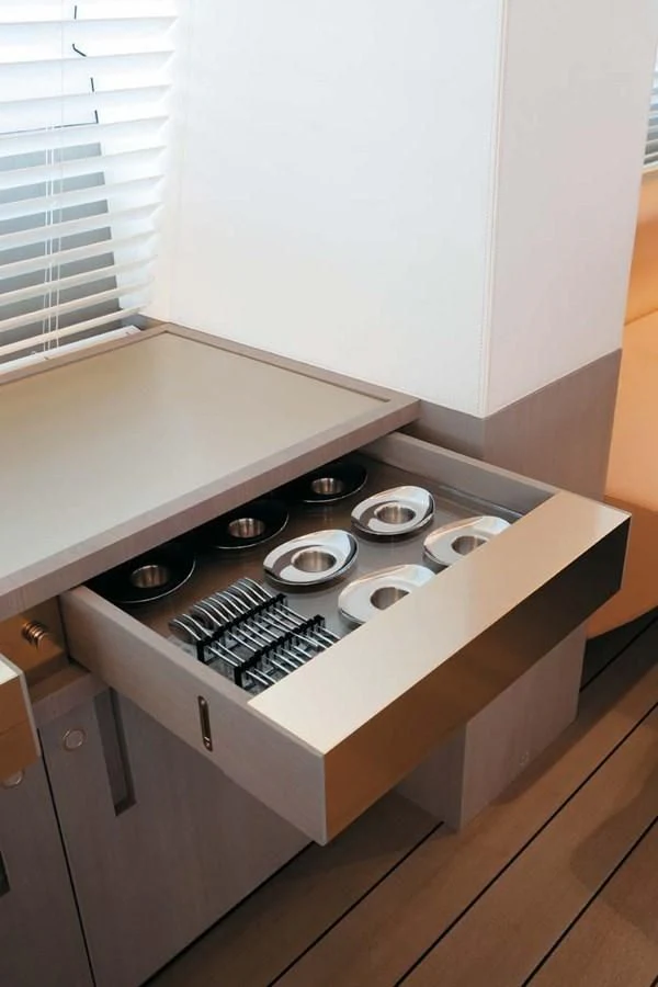 a counter top with a lot of silver coins on it aboard ENTERPRISE Yacht for Sale
