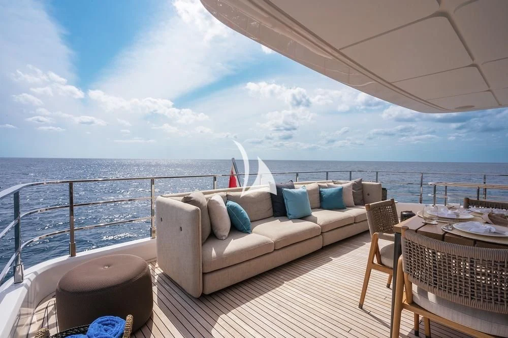 a large white bed on a boat aboard JYC Yacht for Sale