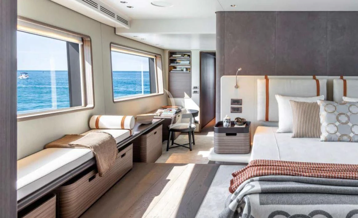 a room with two beds aboard JYC Yacht for Sale