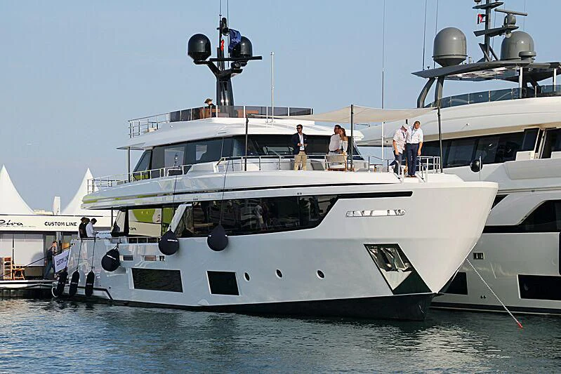 a boat with a satellite dish on the deck aboard JYC Yacht for Sale