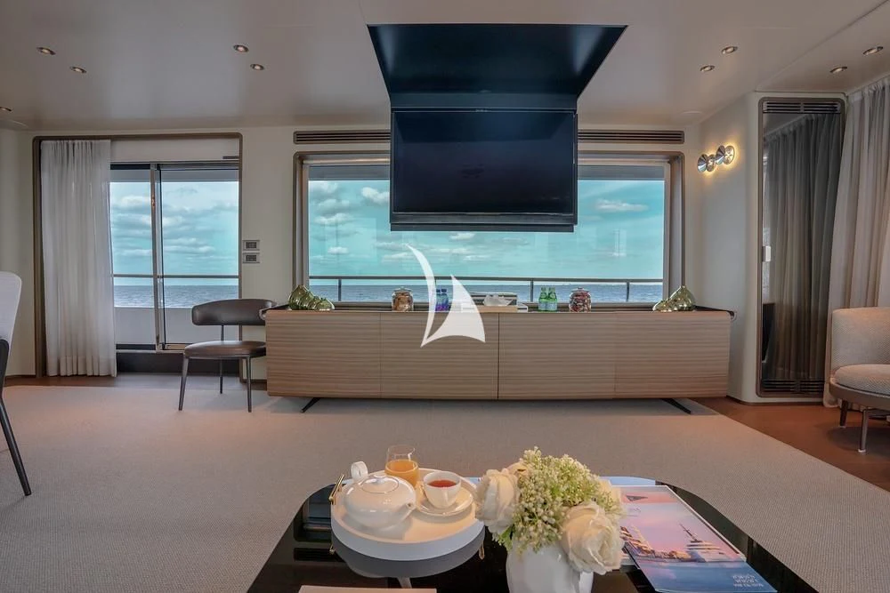 a modern looking living room aboard JYC Yacht for Sale