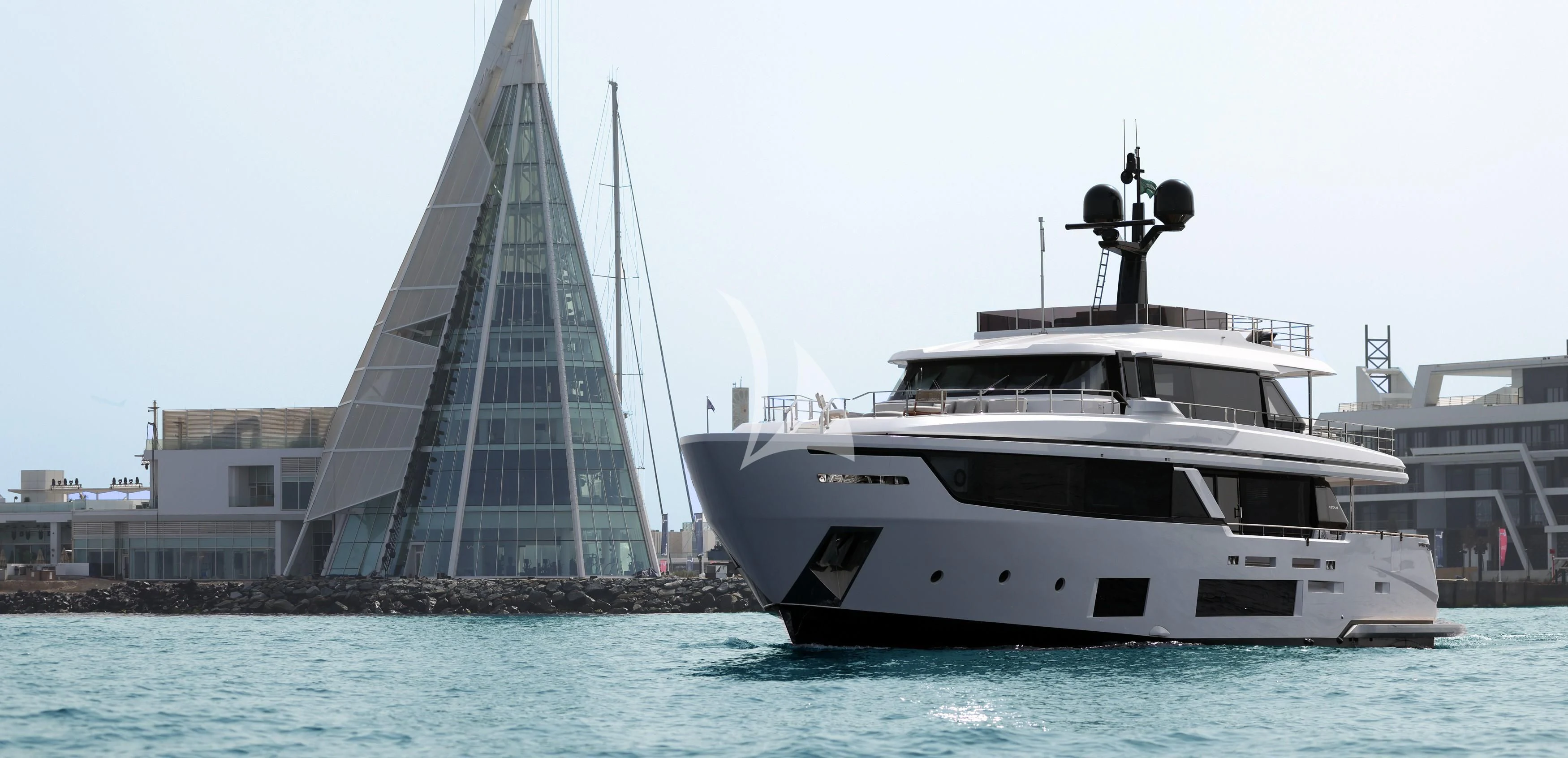 a large white boat in the water aboard JYC Yacht for Sale