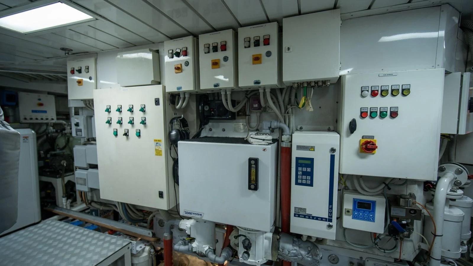 a room with several white machines aboard ORINOKIA Yacht for Sale