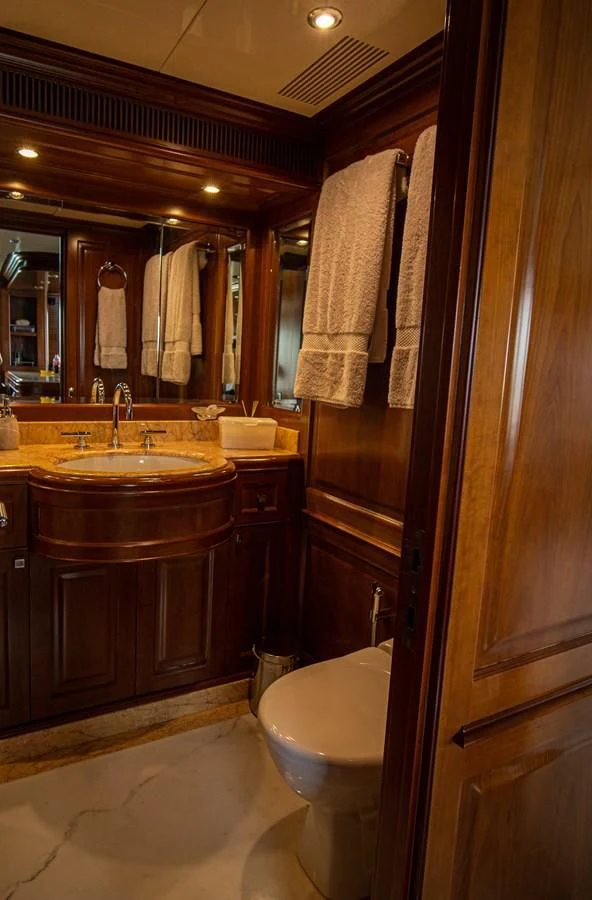 a bathroom with a sink and a toilet aboard ORINOKIA Yacht for Sale
