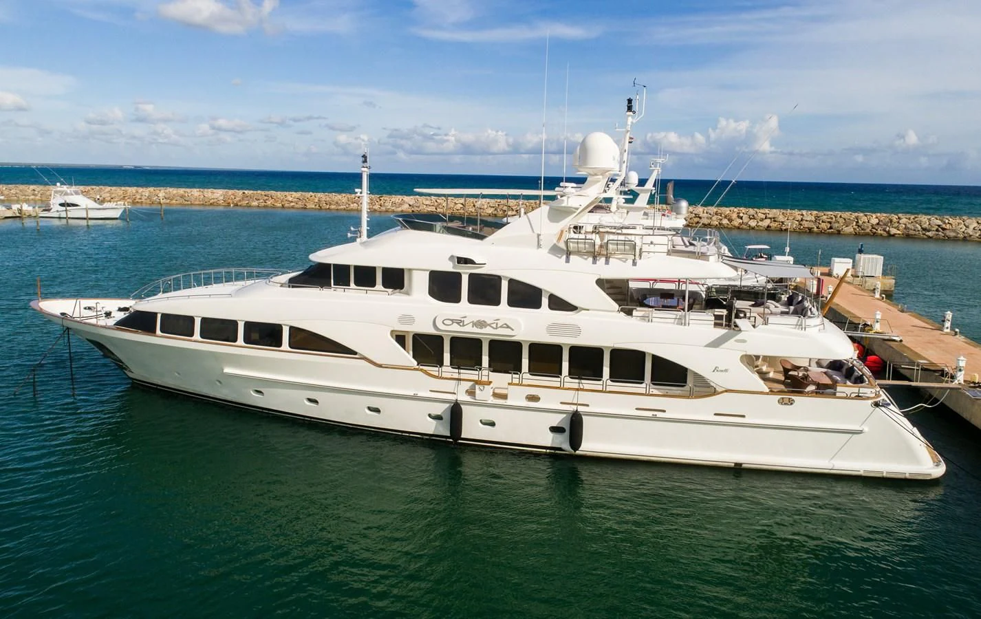 a large white boat in the water aboard ORINOKIA Yacht for Sale