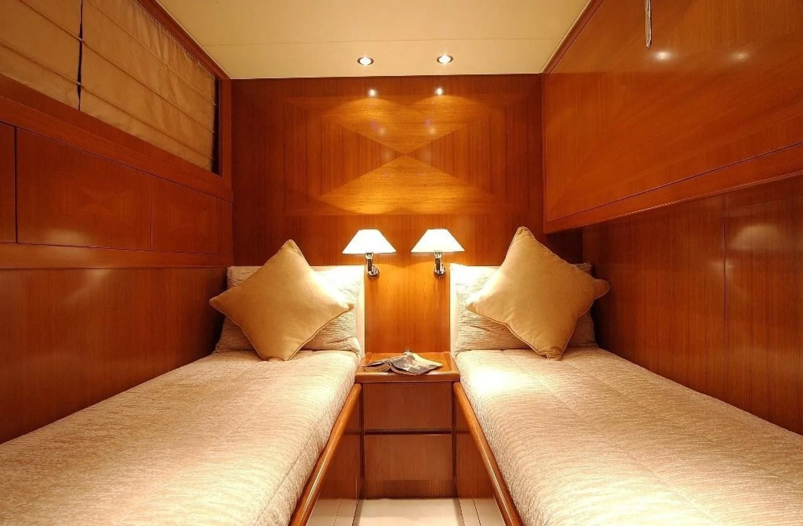 a room with two beds aboard TOBEKA Yacht for Sale