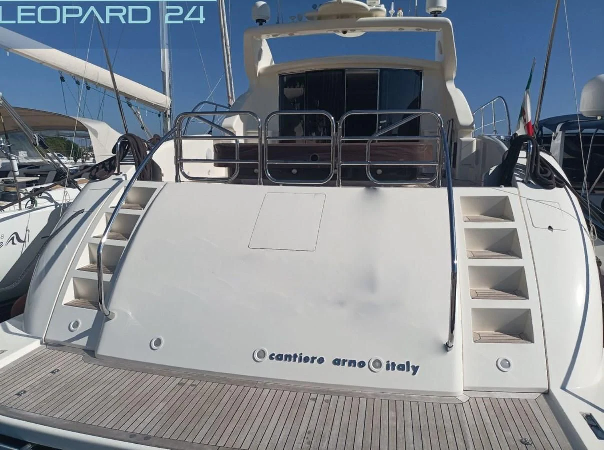 a white yacht with a deck aboard TOBEKA Yacht for Sale