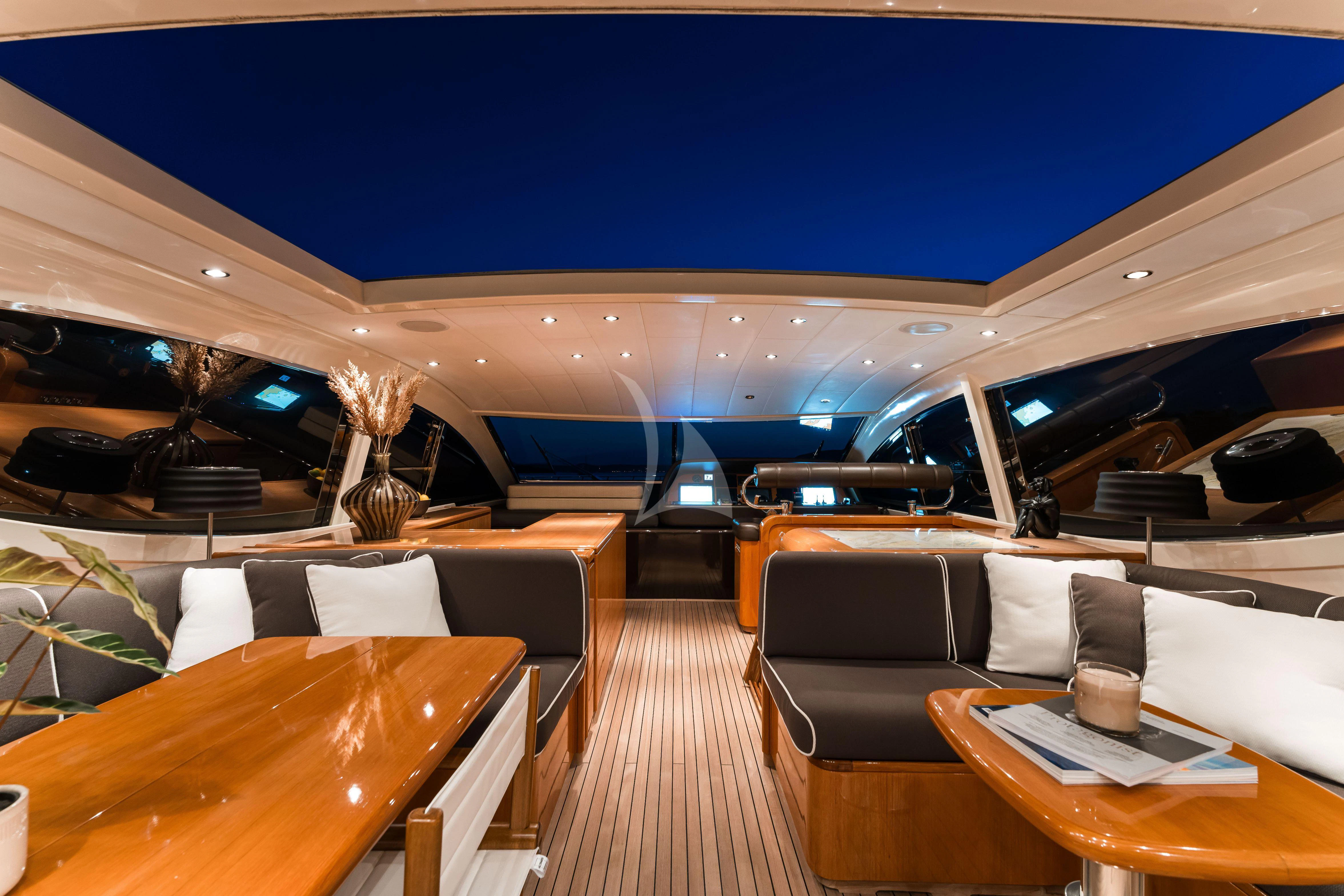 a room with a couch and a table aboard TOBEKA Yacht for Sale