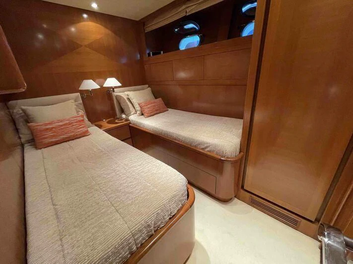 a room with two beds aboard TOBEKA Yacht for Sale