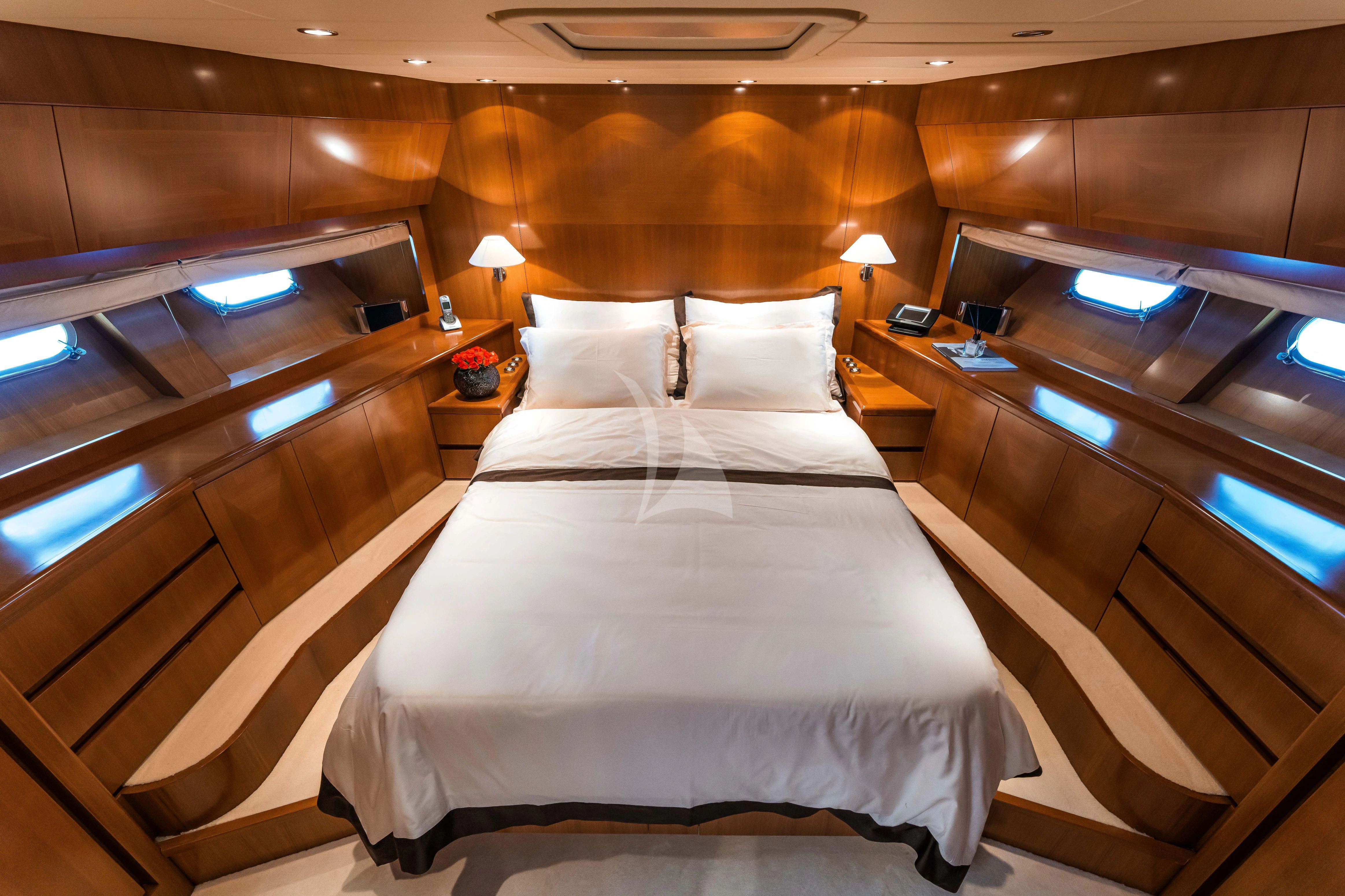a room with two beds aboard TOBEKA Yacht for Sale