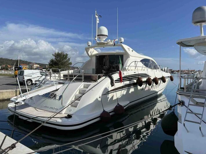 a group of boats are parked in a harbor aboard TOBEKA Yacht for Sale