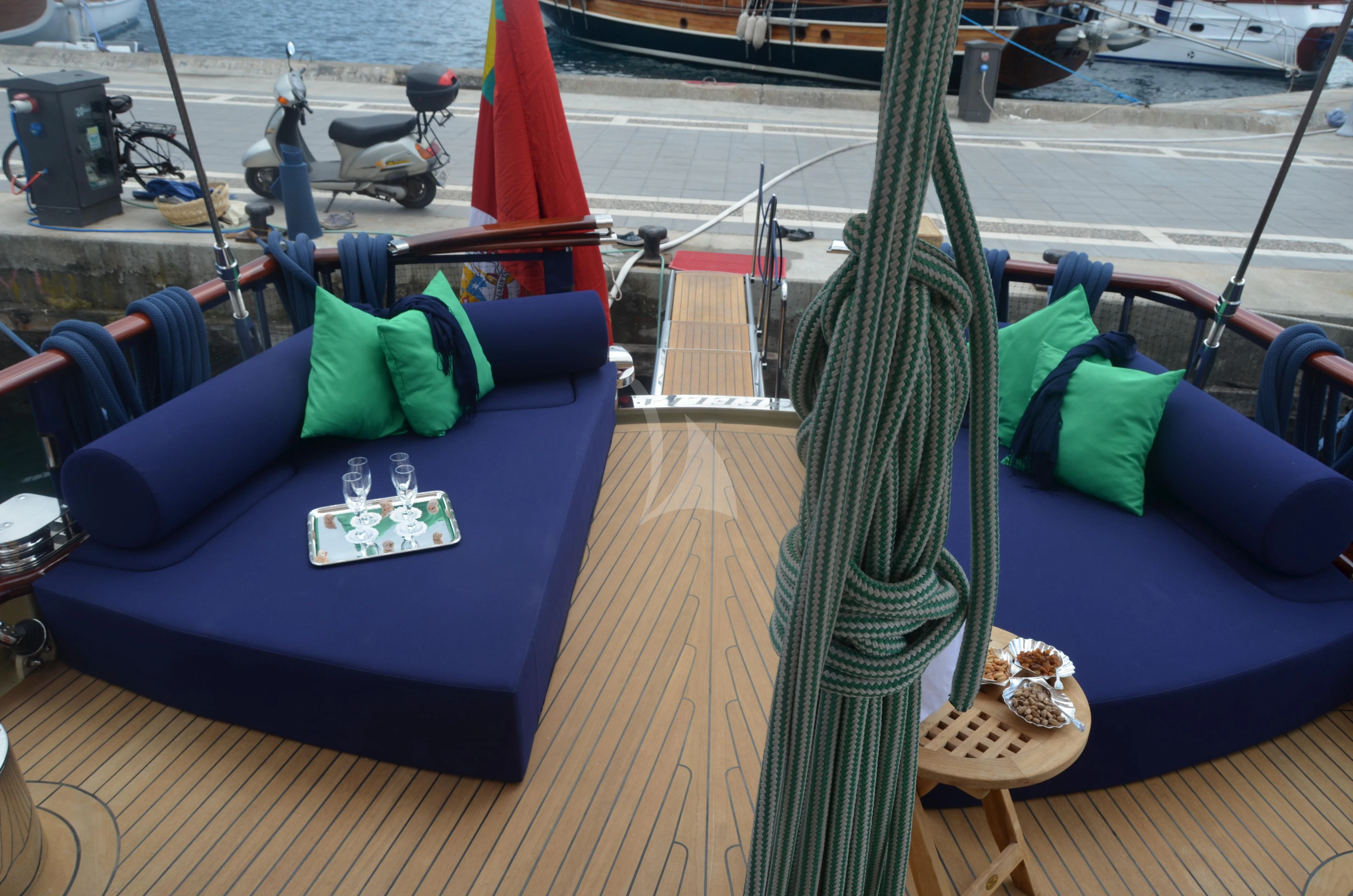 a boat on a deck aboard OFELIA Yacht for Sale