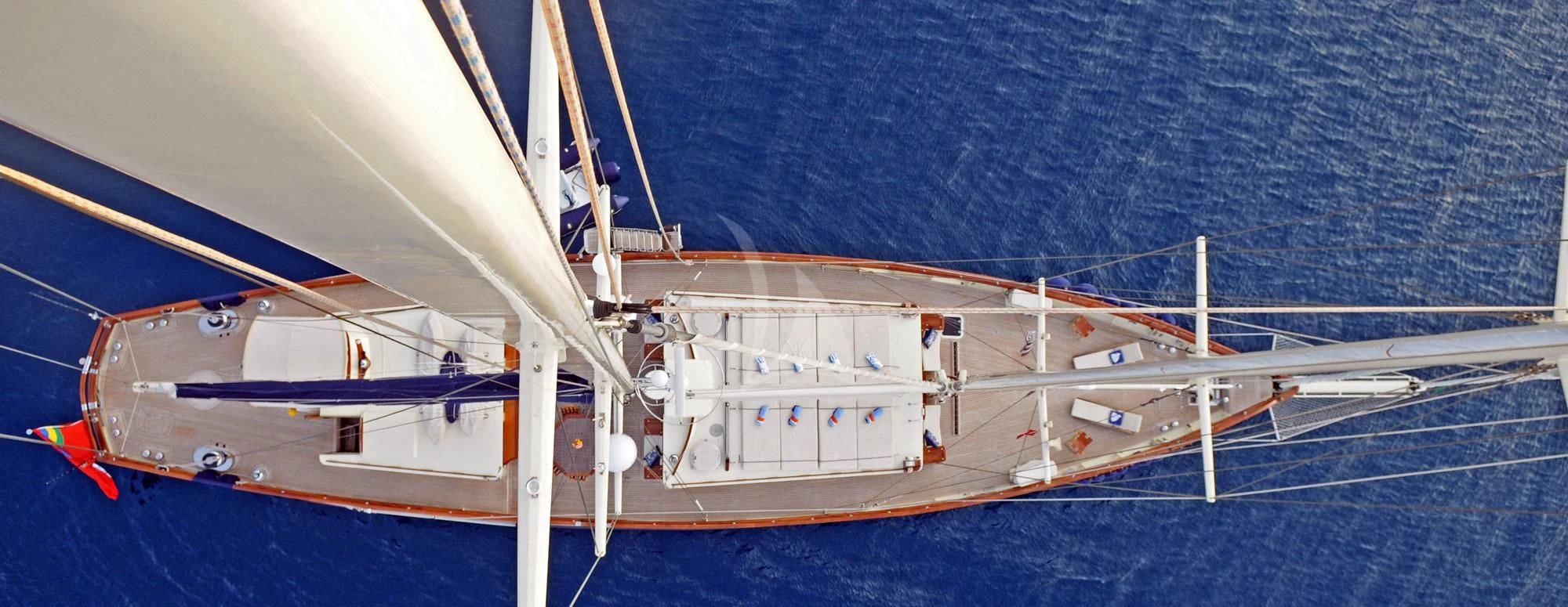 a large white ship aboard OFELIA Yacht for Sale