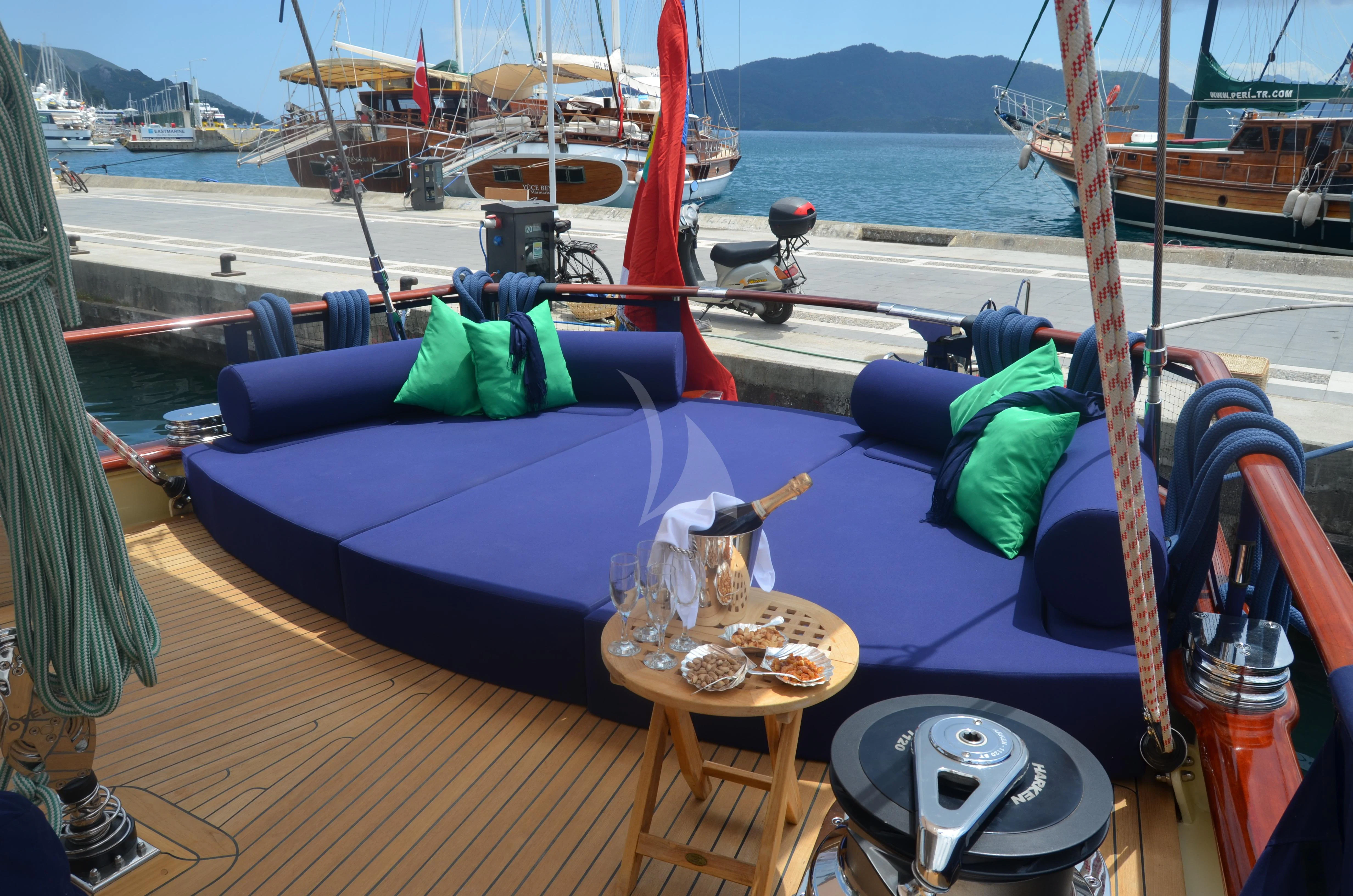 a boat with a statue on it aboard OFELIA Yacht for Sale