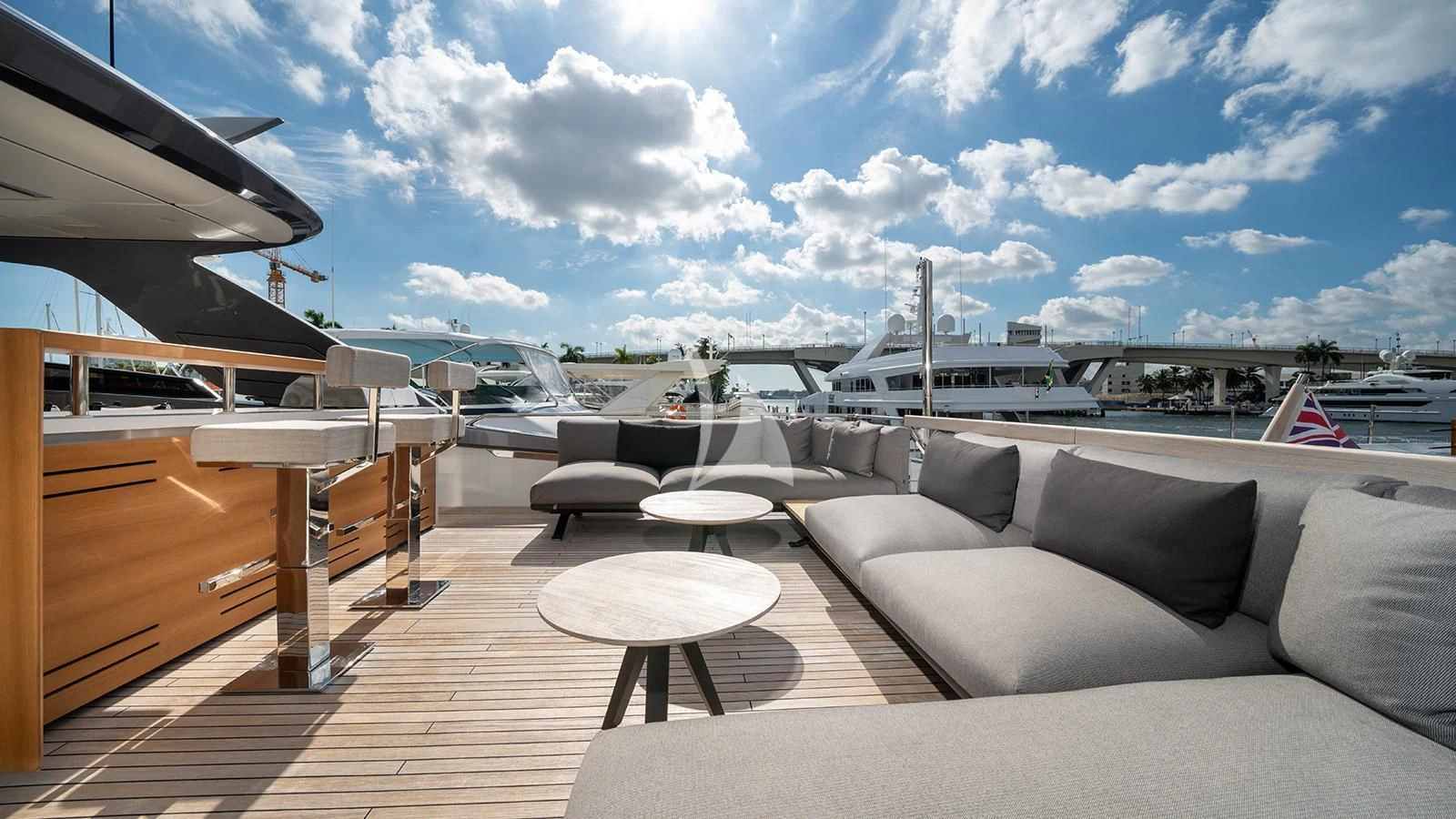 a room with a couch and a table and chairs aboard ADIOS Yacht for Charter