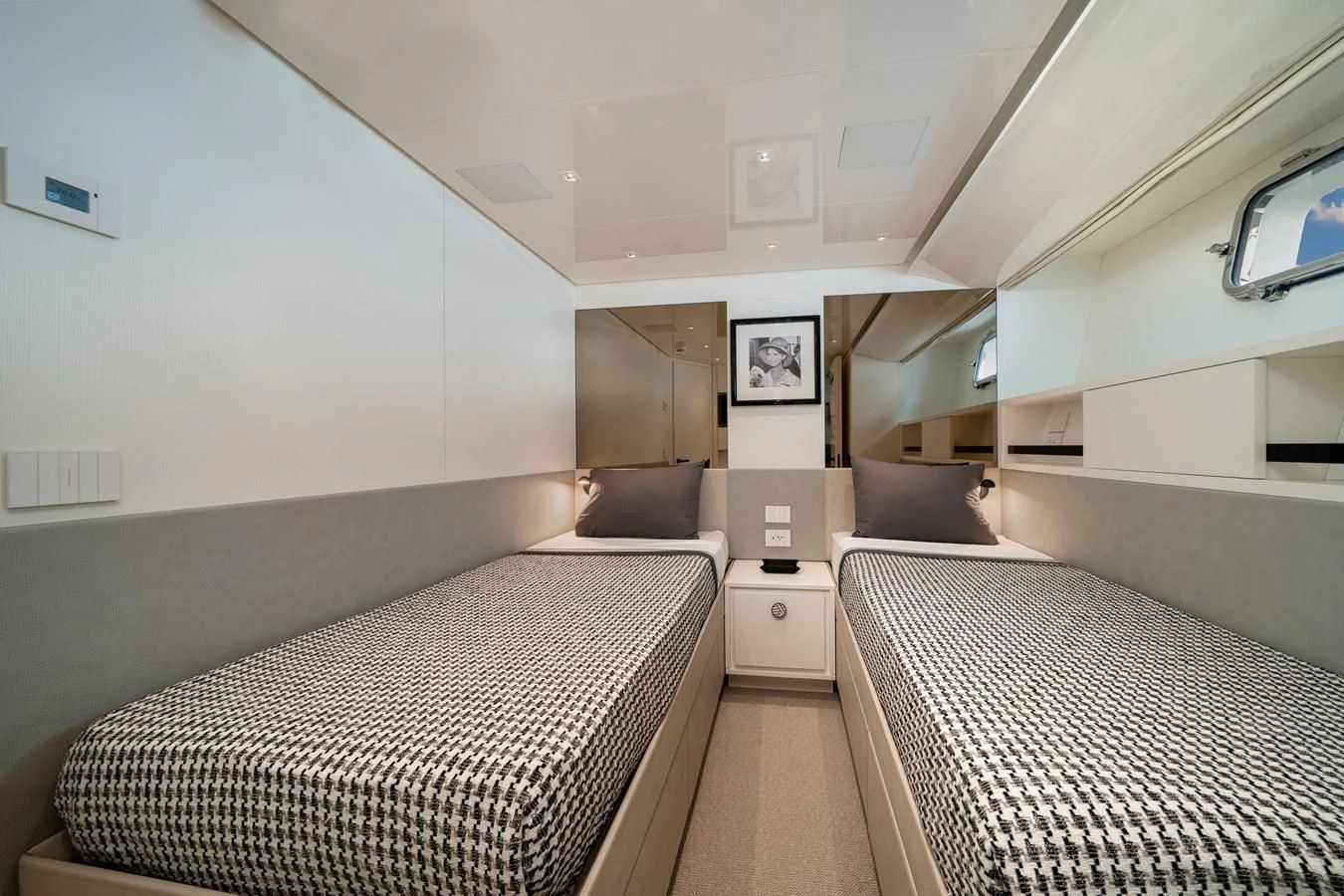 a room with two beds aboard ADIOS Yacht for Charter