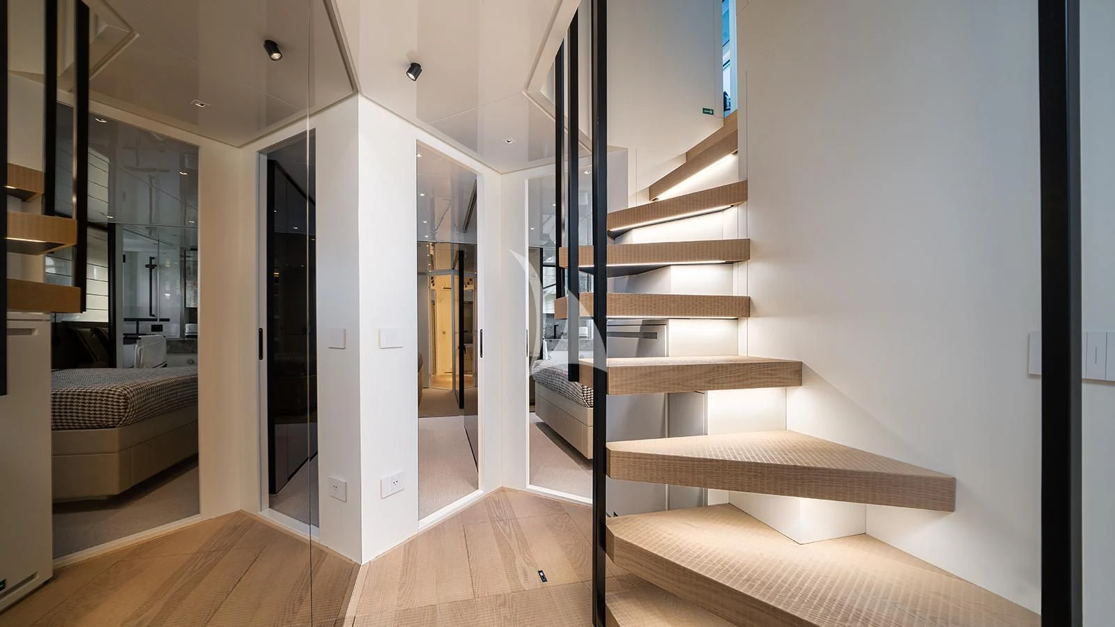a staircase in a room aboard ADIOS Yacht for Charter