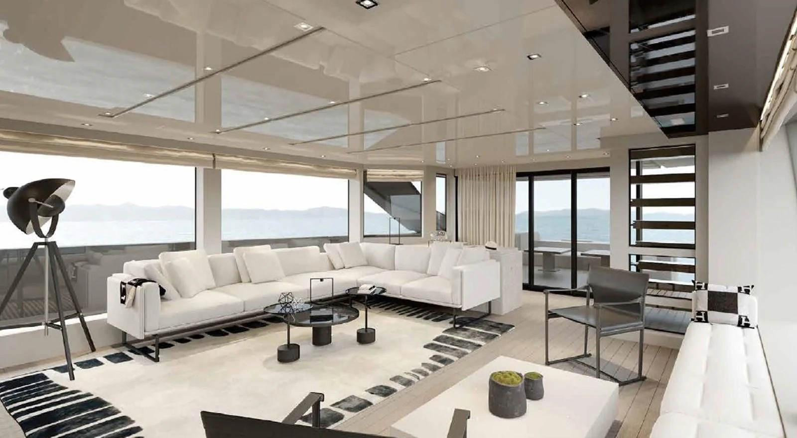 a living room with a large window aboard ADIOS Yacht for Charter