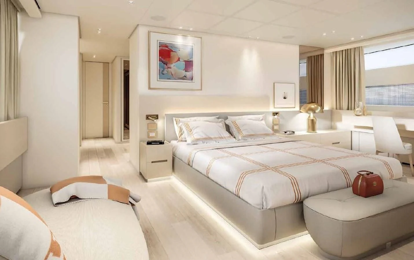a bedroom with a bed and a chair aboard ADIOS Yacht for Charter