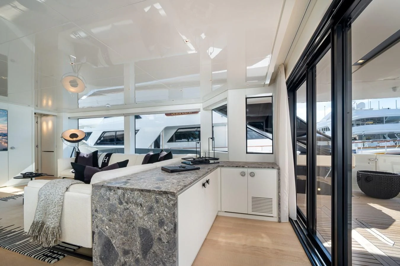 a room with a large glass door aboard ADIOS Yacht for Charter