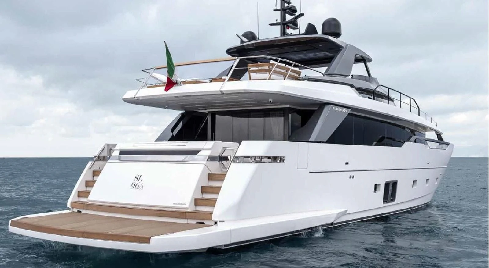 a white yacht in the water aboard ADIOS Yacht for Charter