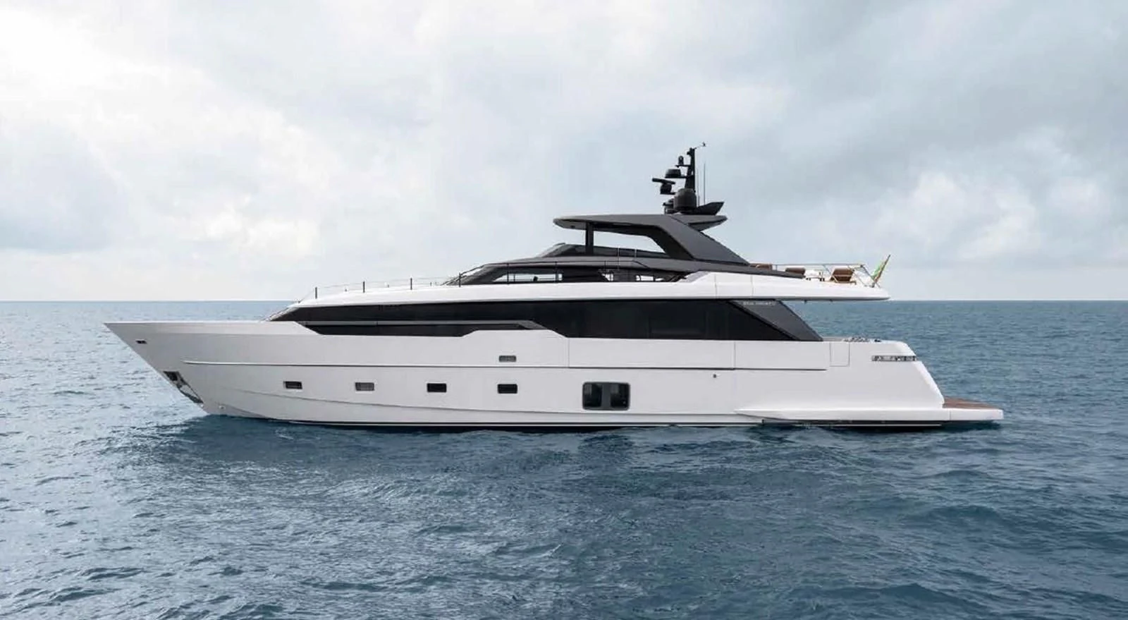 a white yacht in the water aboard ADIOS Yacht for Charter