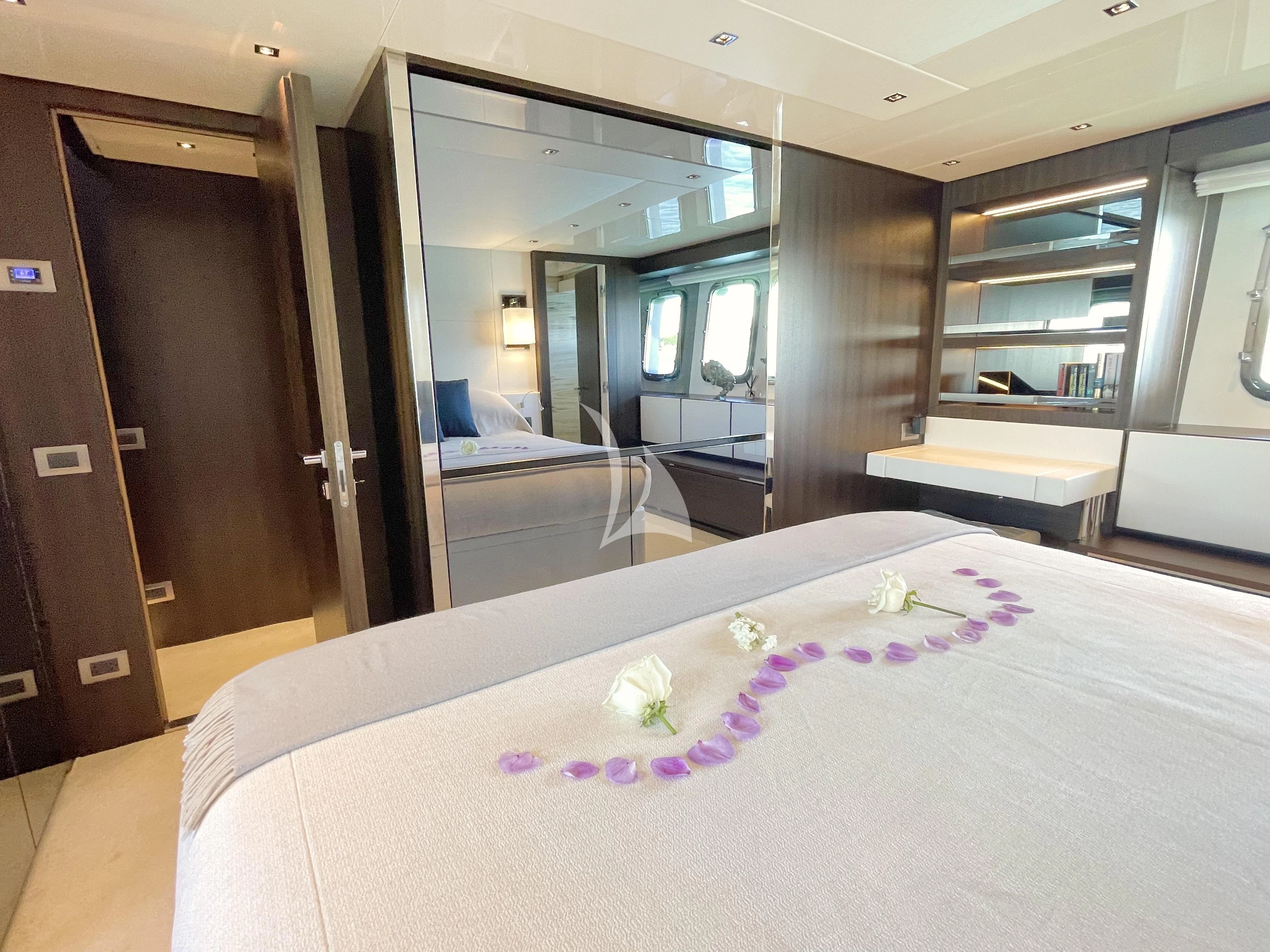 a table with a flower on it aboard C-DAZE Yacht for Sale