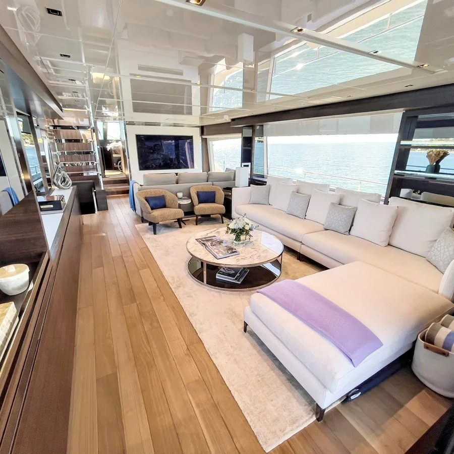 a living room with a wood floor aboard C-DAZE Yacht for Sale