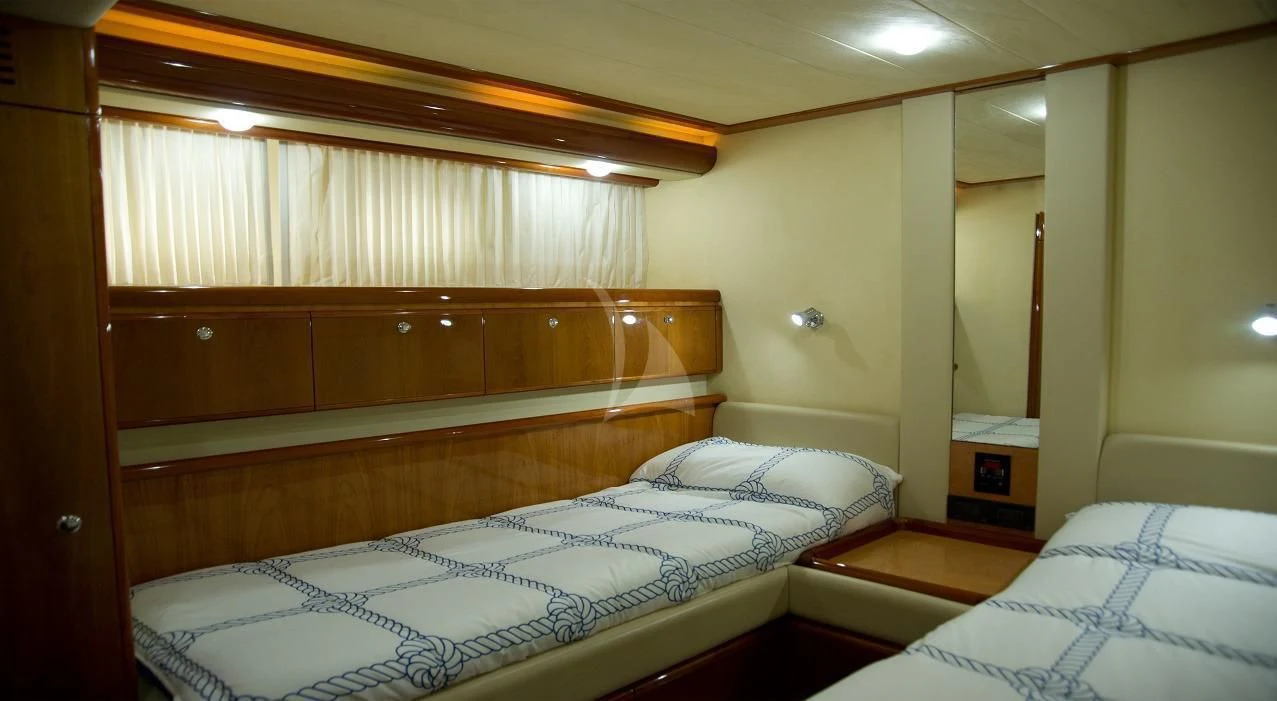 a room with two beds aboard PAMPERO Yacht for Charter