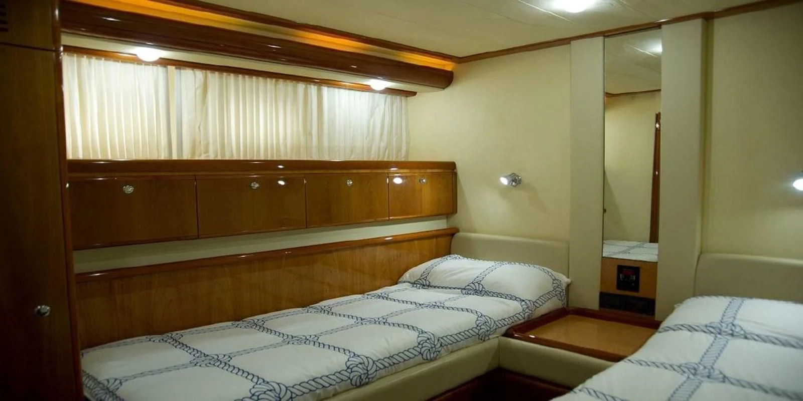 a room with two beds aboard PAMPERO Yacht for Charter
