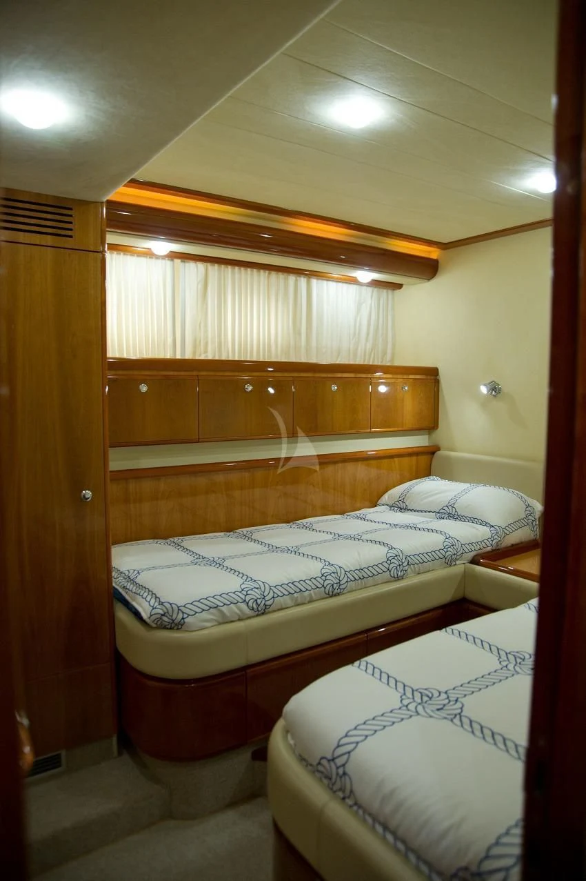 a room with two beds aboard PAMPERO Yacht for Charter