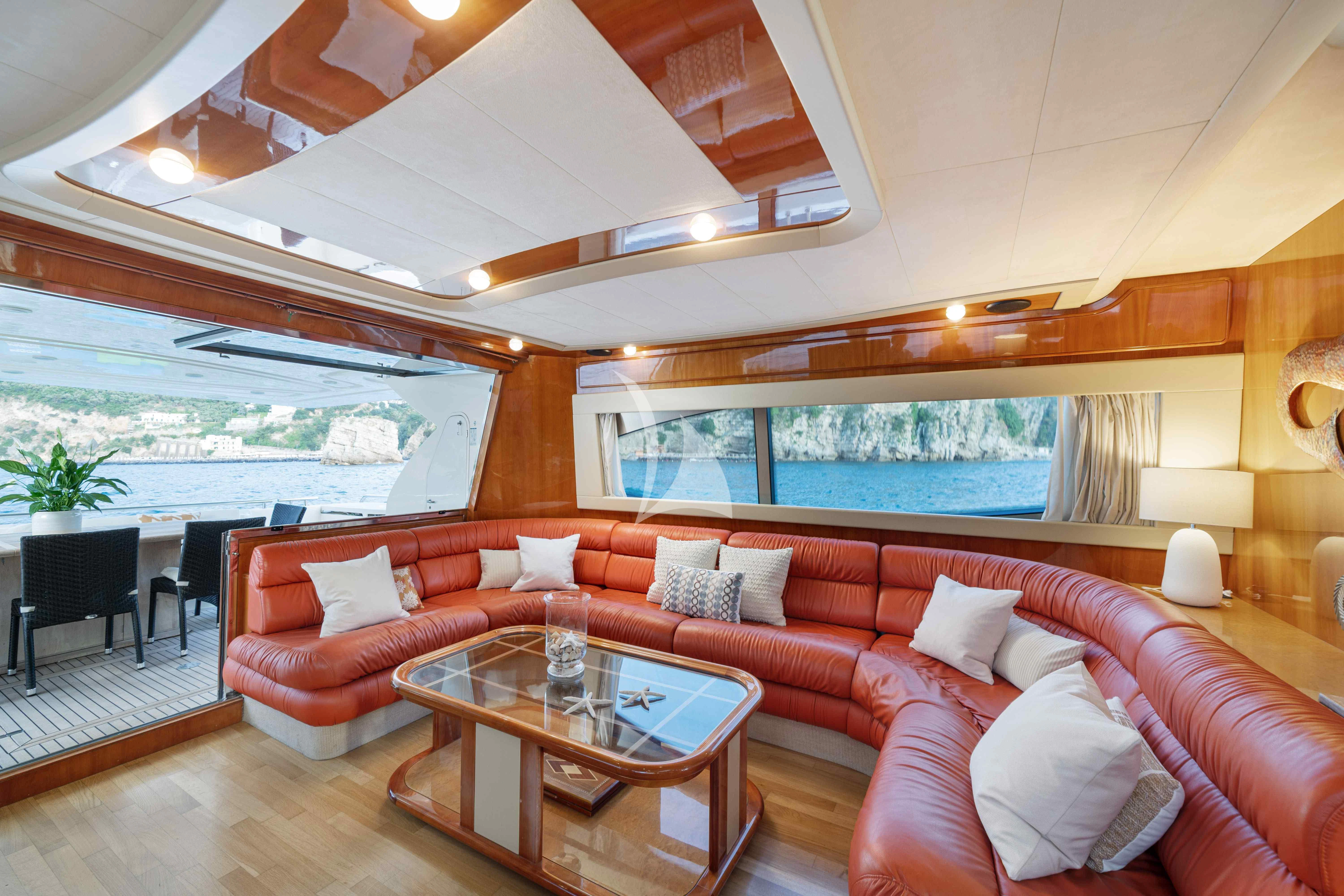 a living room with a large window aboard PAMPERO Yacht for Charter