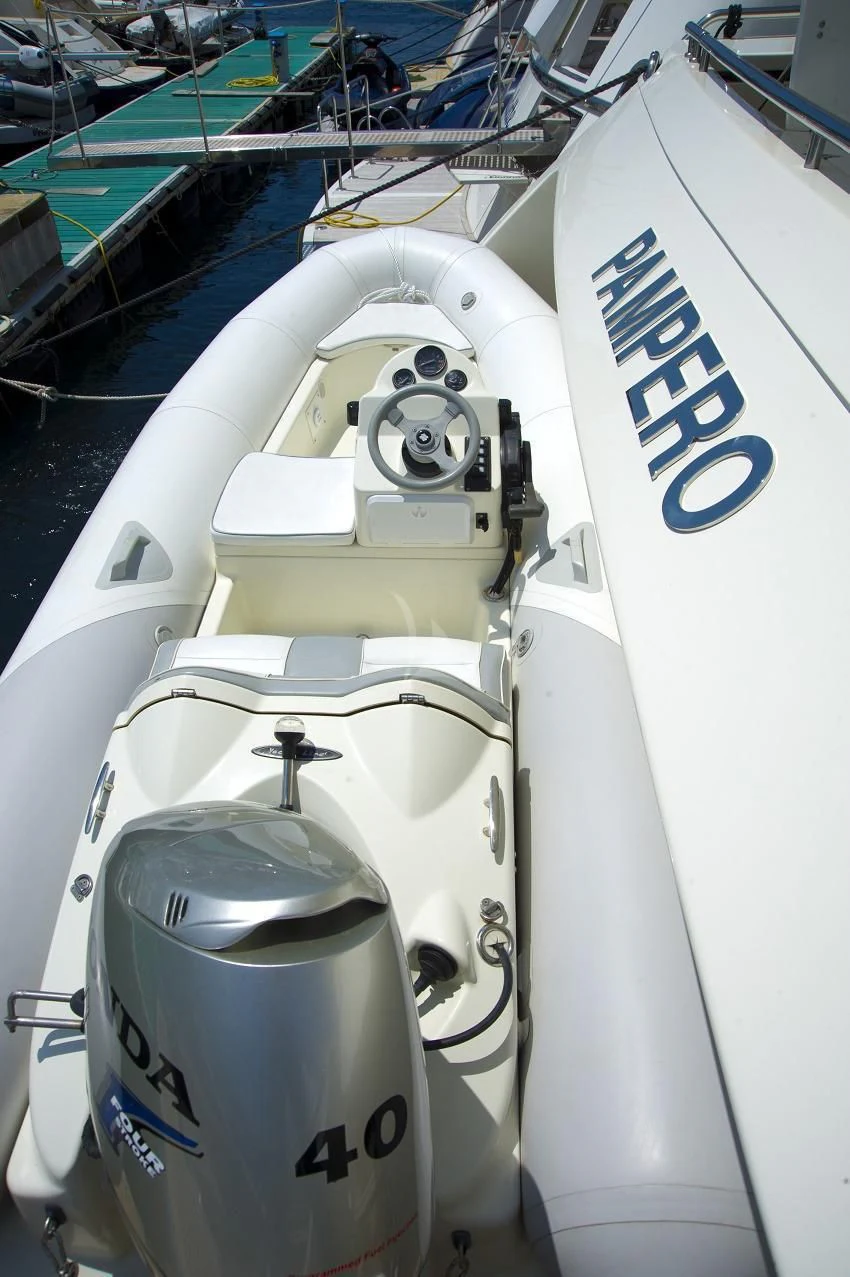 a close-up of a white car aboard PAMPERO Yacht for Charter
