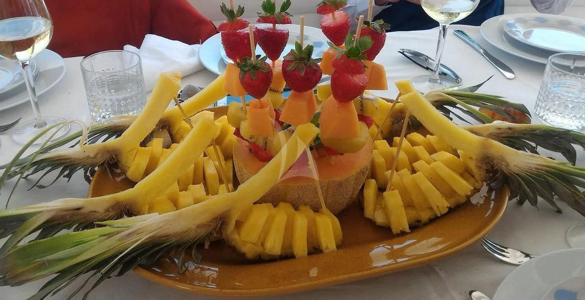 a plate of food aboard PAMPERO Yacht for Charter