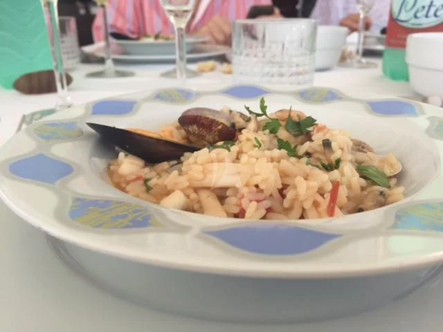 a plate of food aboard PAMPERO Yacht for Charter