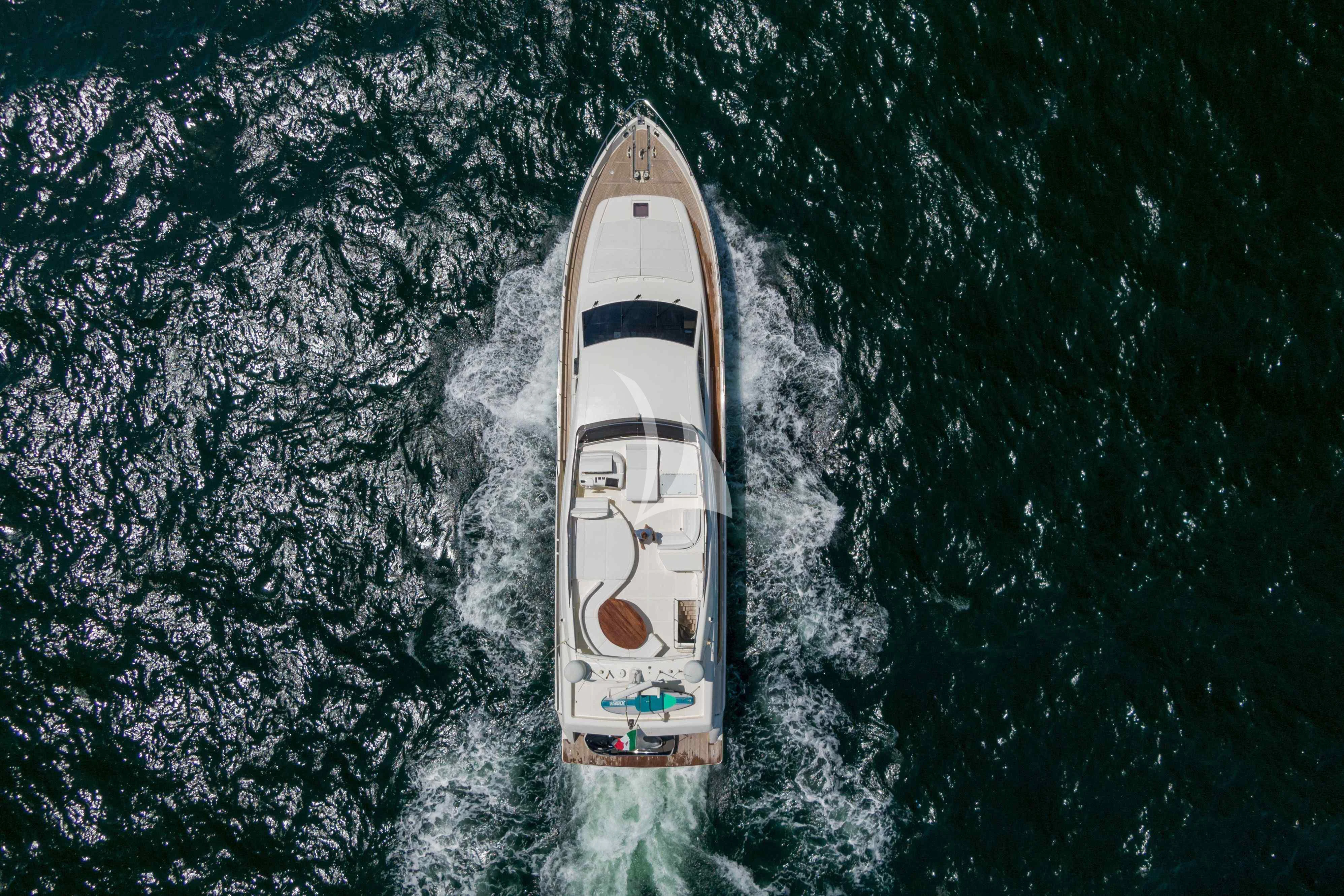 a white vehicle on a road aboard PAMPERO Yacht for Charter