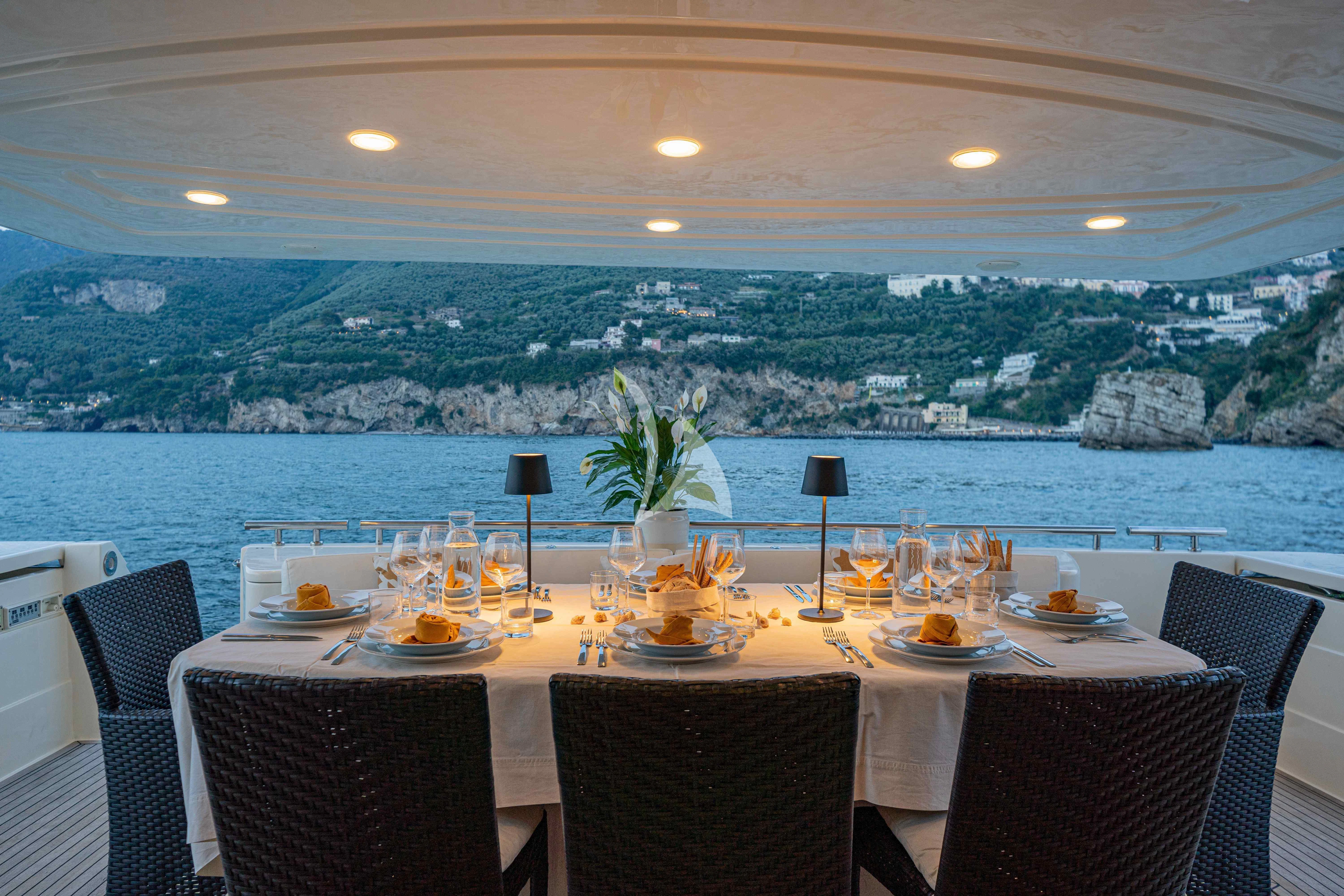 a table set for a meal aboard PAMPERO Yacht for Charter