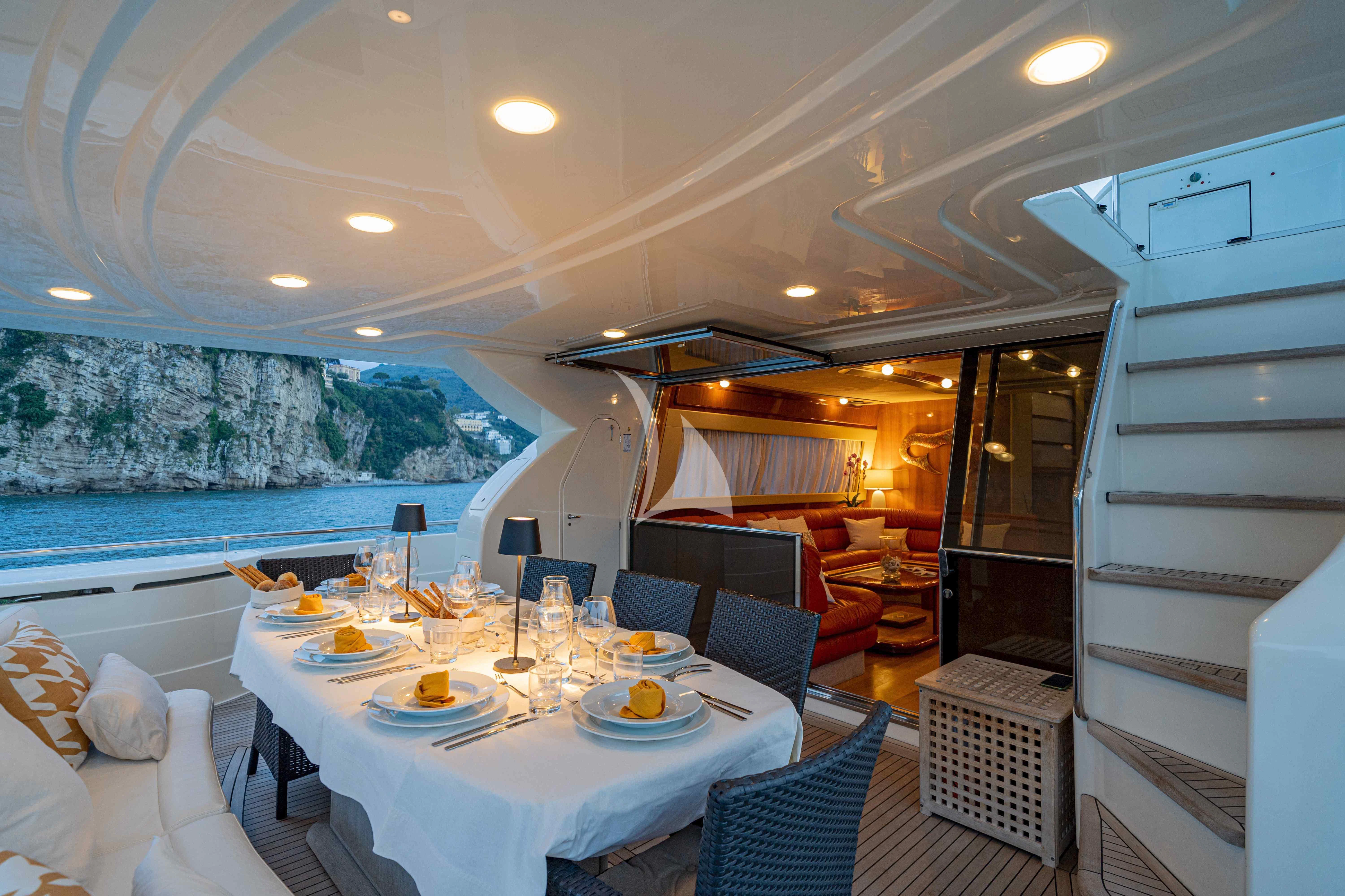 a dining room with a large swimming pool aboard PAMPERO Yacht for Charter