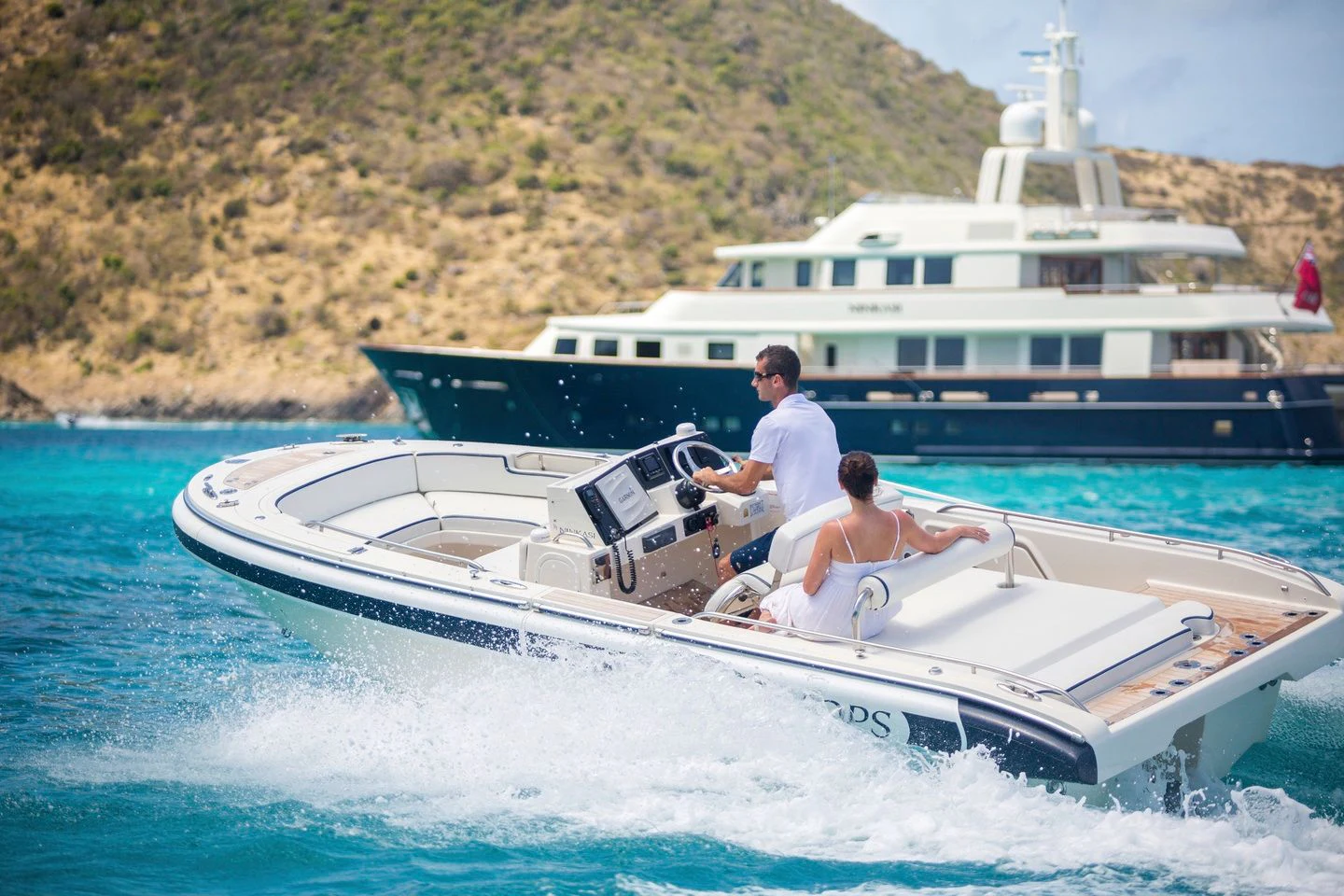 a man and woman on a boat aboard FABULOUS CHARACTER Yacht for Charter