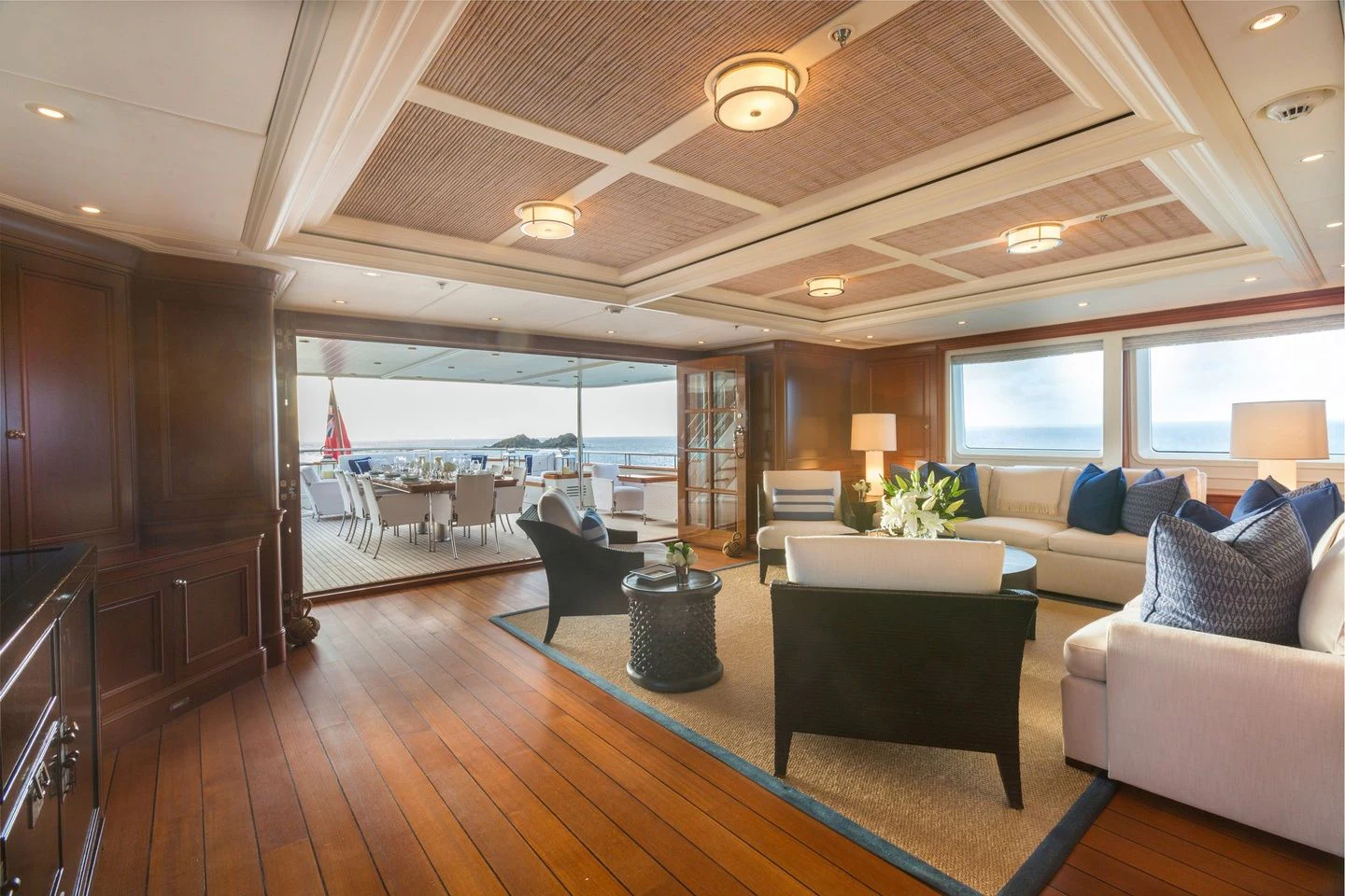 a living room with a large open window aboard FABULOUS CHARACTER Yacht for Charter