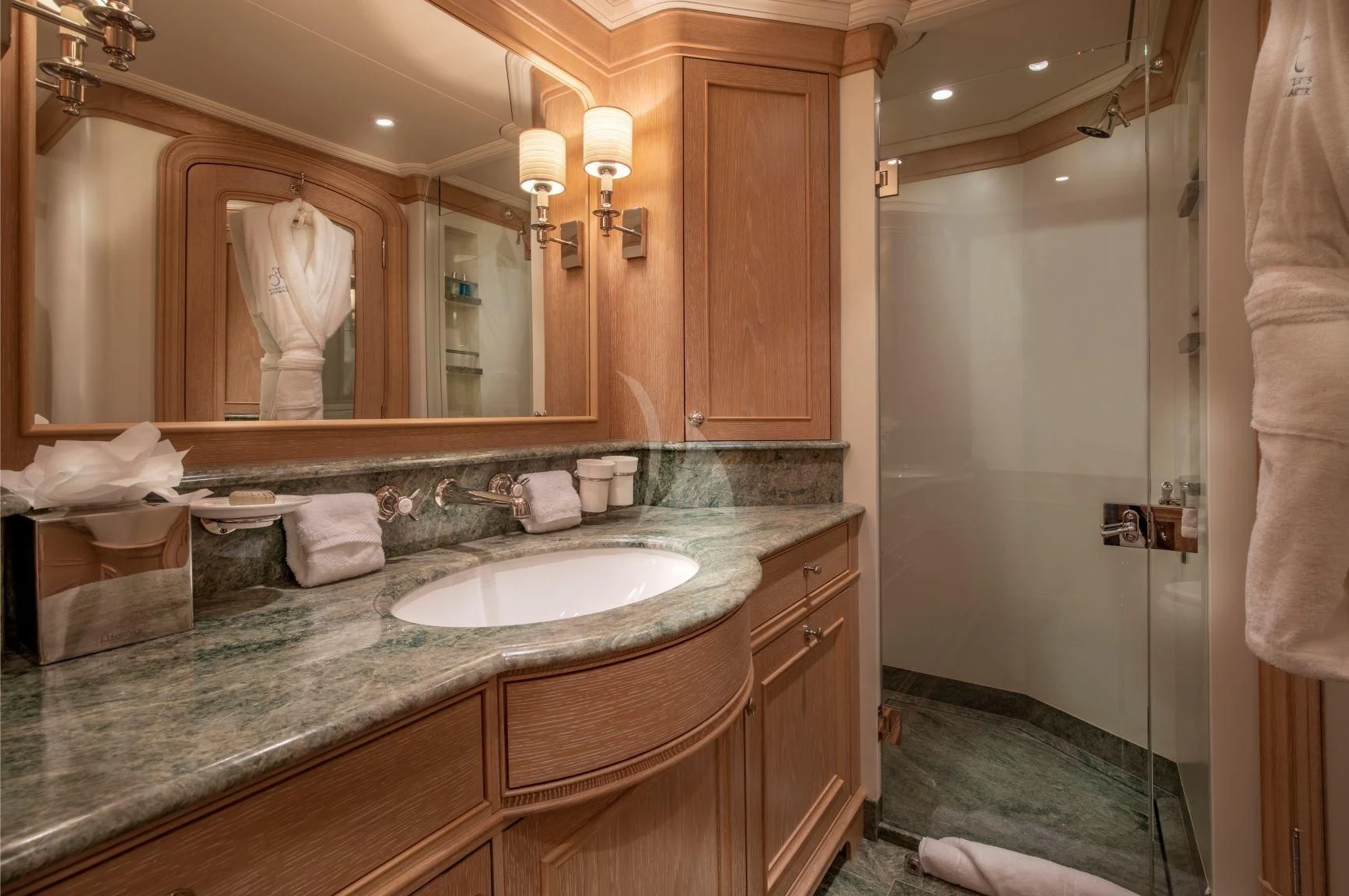 a bathroom with a large mirror aboard FABULOUS CHARACTER Yacht for Charter