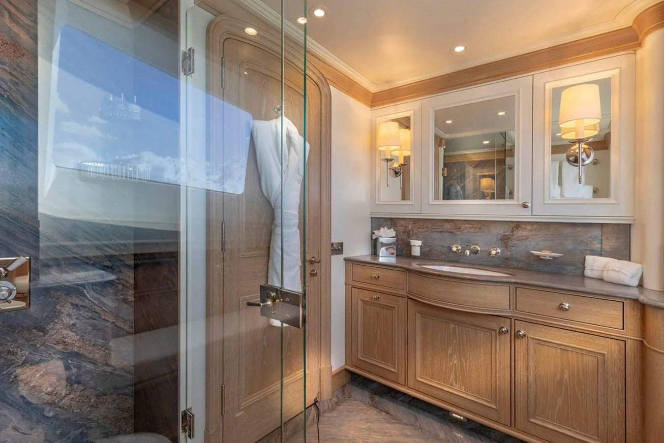 a bathroom with a glass shower aboard FABULOUS CHARACTER Yacht for Charter
