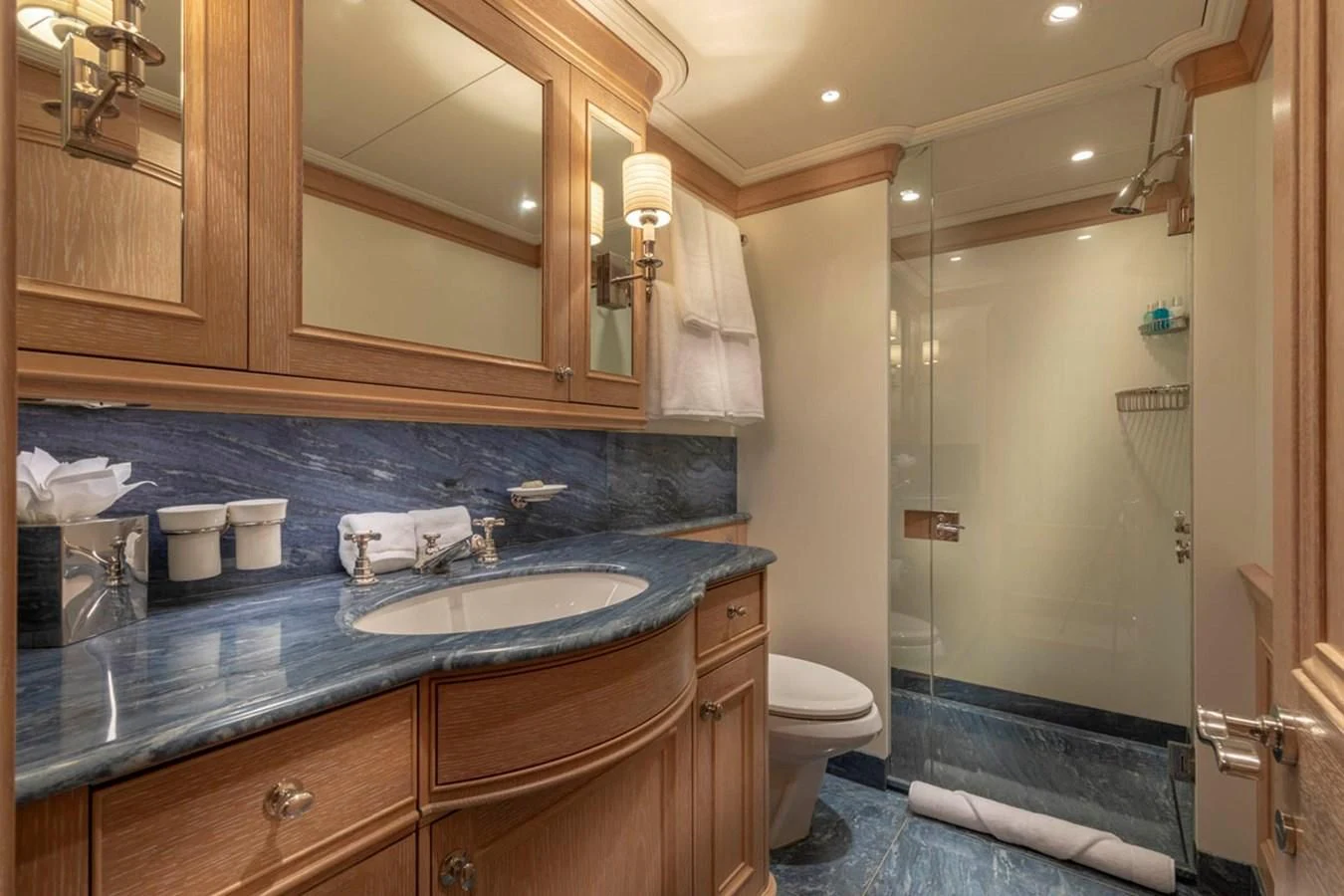 a bathroom with a sink and a shower aboard FABULOUS CHARACTER Yacht for Charter