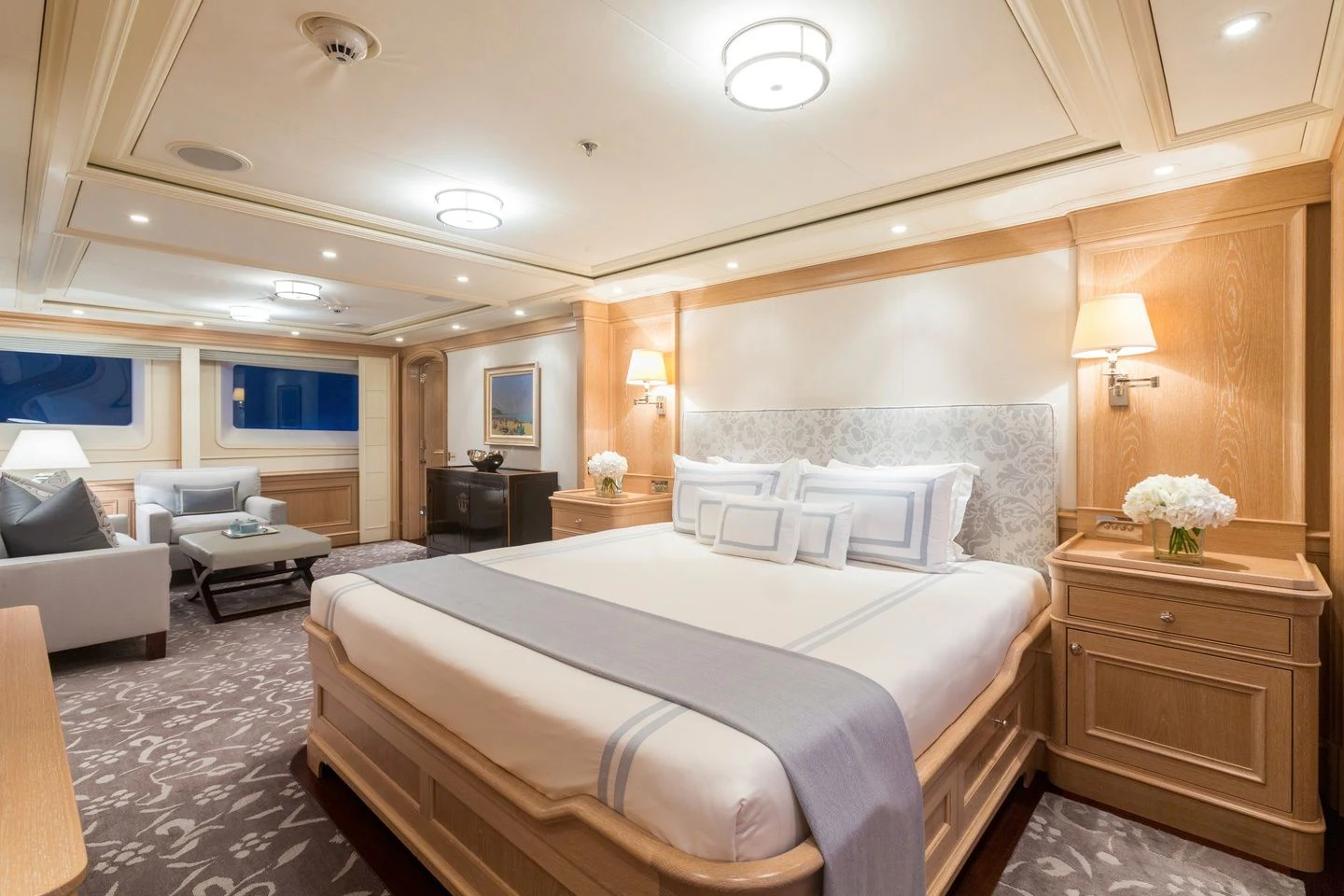 a large bedroom with a large bed aboard FABULOUS CHARACTER Yacht for Charter