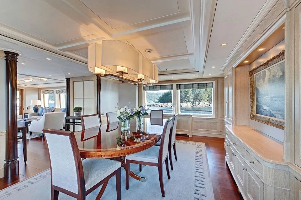 a large dining room with a large open floor plan aboard FABULOUS CHARACTER Yacht for Charter