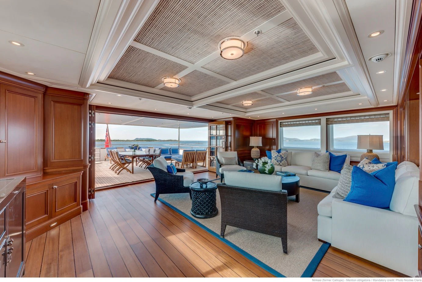 a living room with a large open window aboard FABULOUS CHARACTER Yacht for Charter