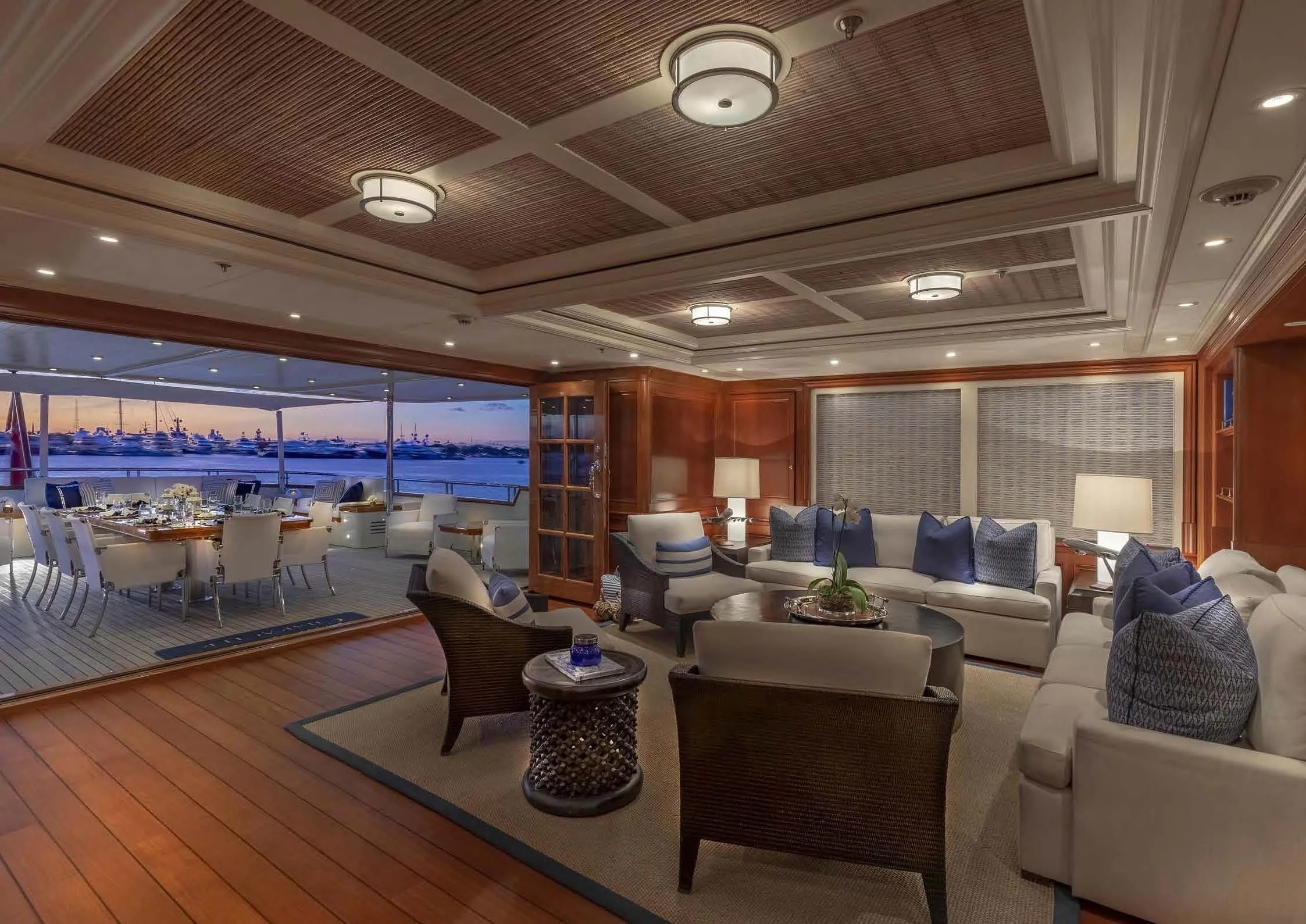 a large living room with a large screen aboard FABULOUS CHARACTER Yacht for Charter