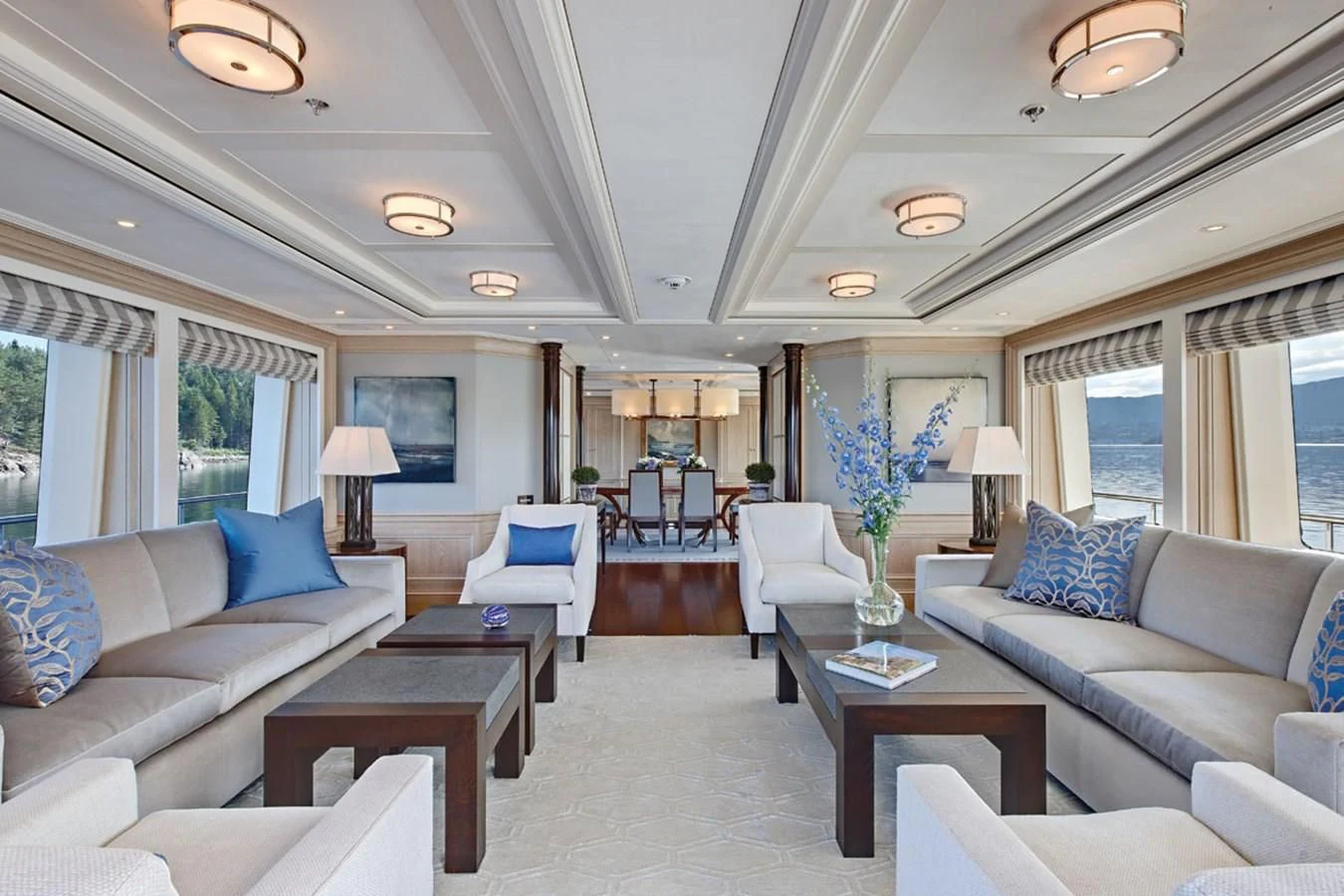 a living room with a couch and a coffee table aboard FABULOUS CHARACTER Yacht for Charter
