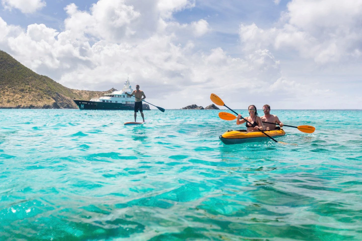 a group of people in a canoe aboard FABULOUS CHARACTER Yacht for Charter