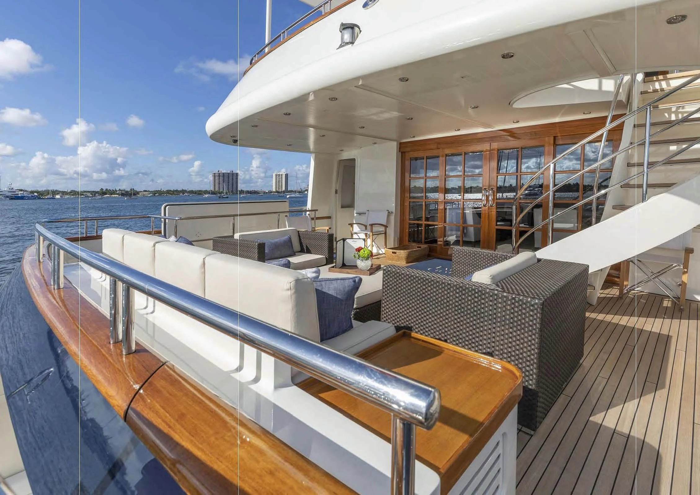 a deck with a view of the ocean and the deck aboard FABULOUS CHARACTER Yacht for Charter
